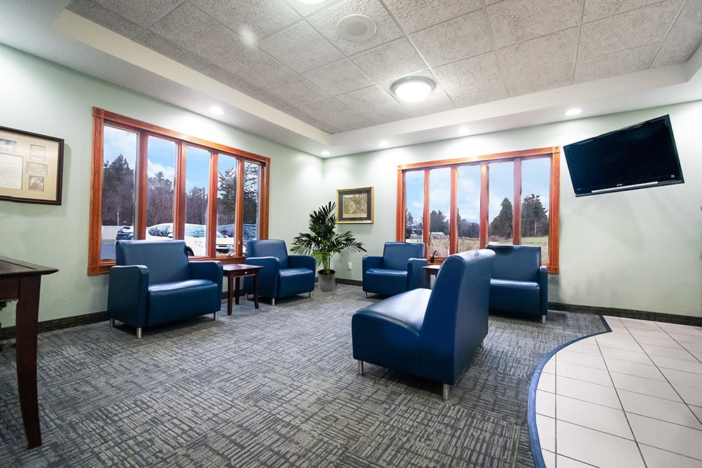 Spacious and comfortable waiting room at our dental office, designed for your relaxation and convenience.